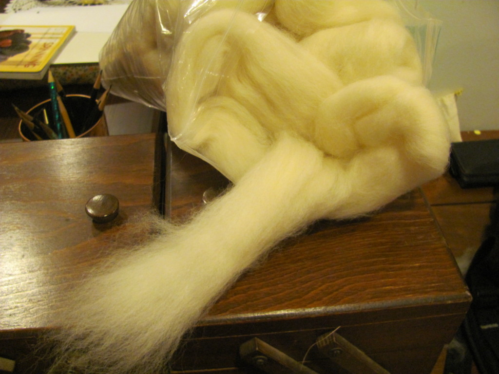 White fluffy roving / top.