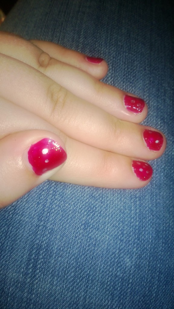 Red nail polish with some dice effects