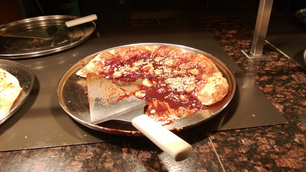Strange pizza-like substance with bananas, oatmeal, and... something.