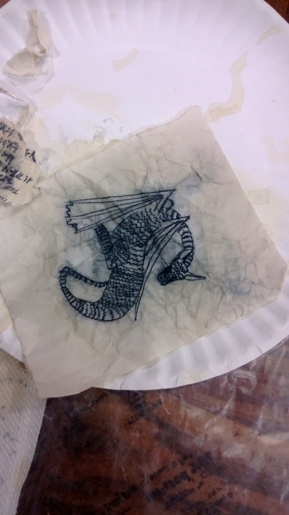 A smudgy ink tea-stained dragon.