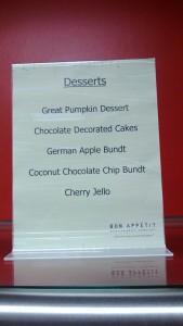 A sign advertising Great Pumpkin dessert.