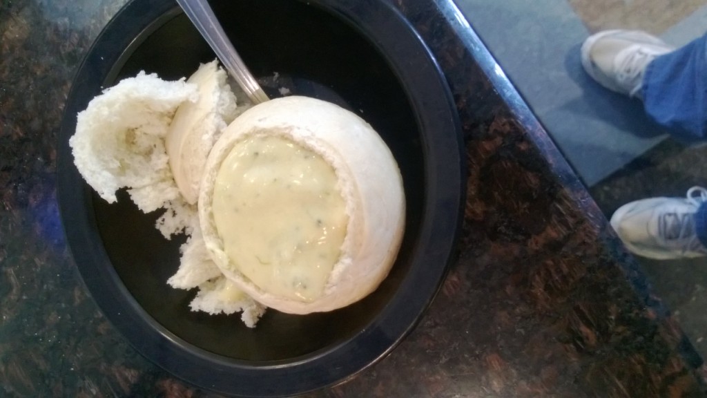 Cheesy soup in a bread-bowl