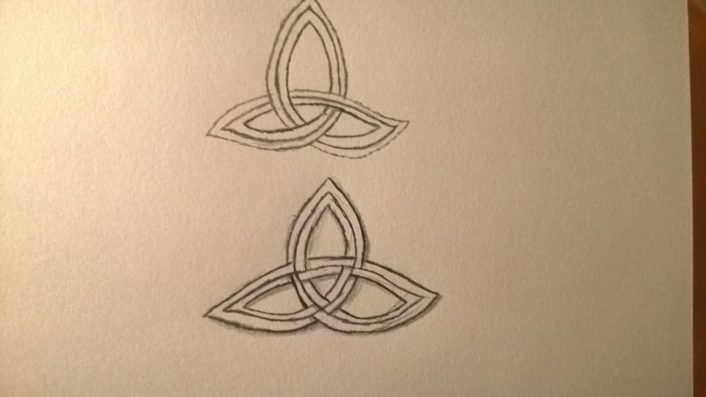 Two pencil-doodle Celtic Trinity Knots