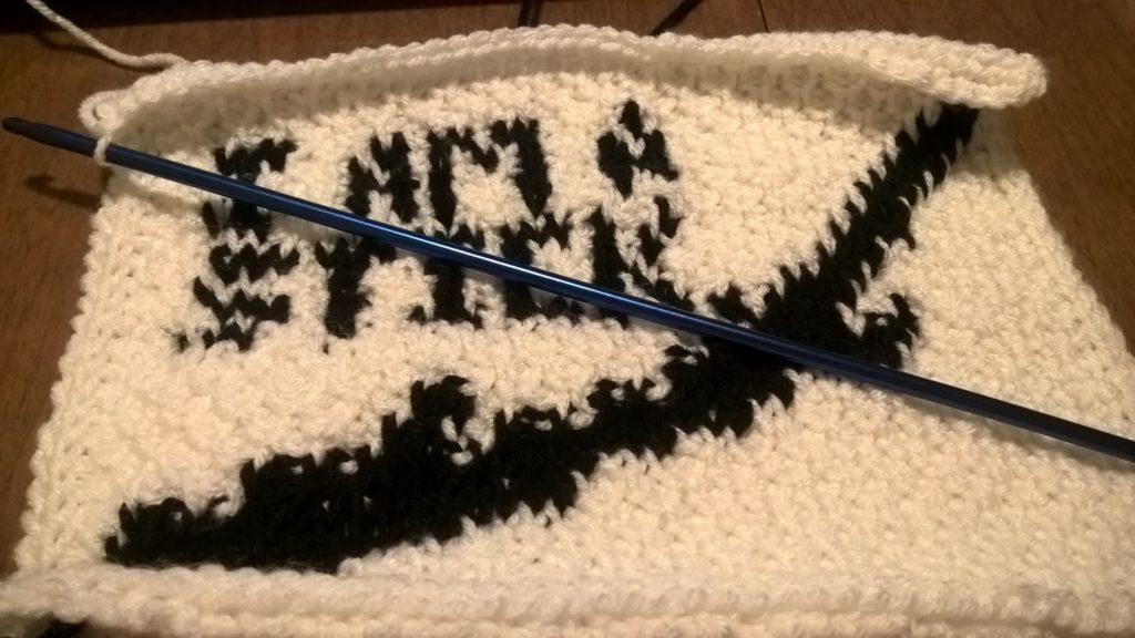 An adamant stick, crocheted.